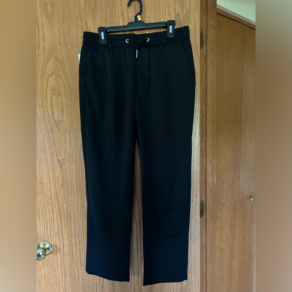 Men’s athletic pants by Stridecool.  NWT.  Black